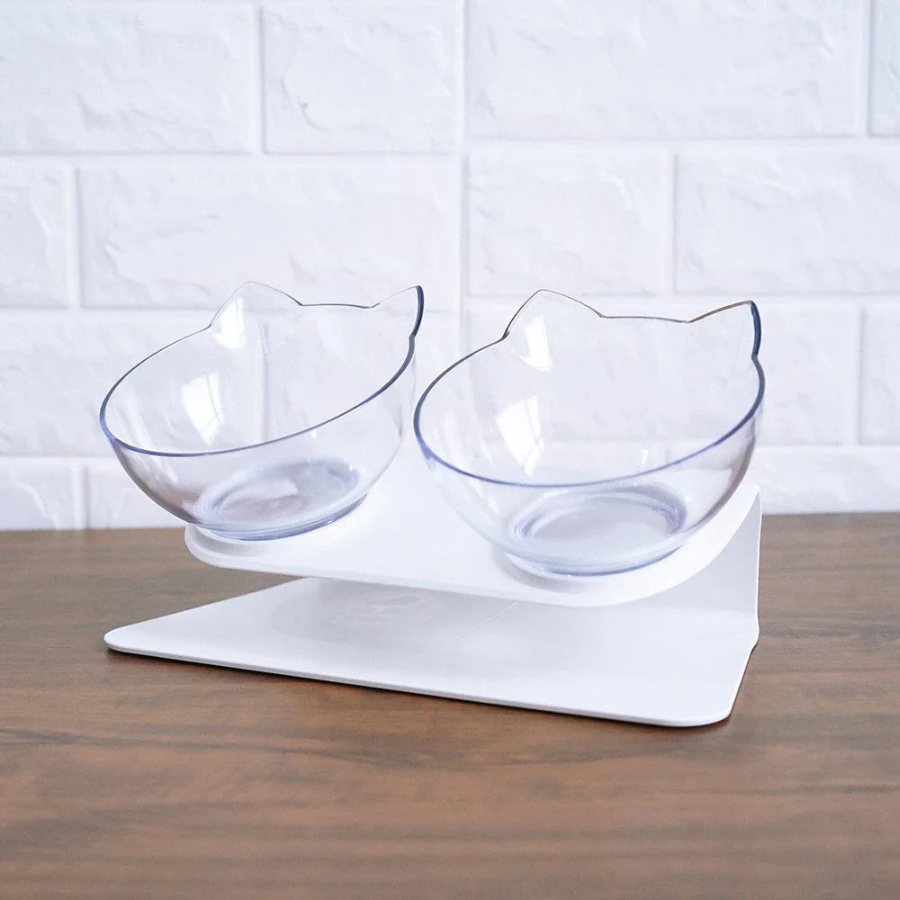 Elevated tilted pet bowl with non-slip stand in transparent, white, and black color options