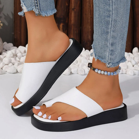 Stylish thick-soled clip-toe slippers for women in various colours, perfect for summer casual wear.
