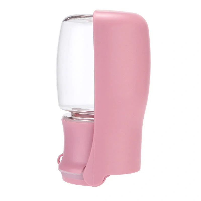 Foldable dog water bottle in blue, white, and pink, perfect for outdoor adventures with your pet.