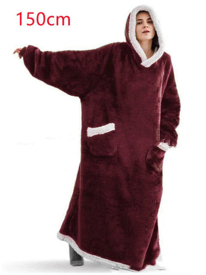 Comfy oversized TV hoodie blanket in various stylish colors, perfect for cozy movie nights and relaxation at home.