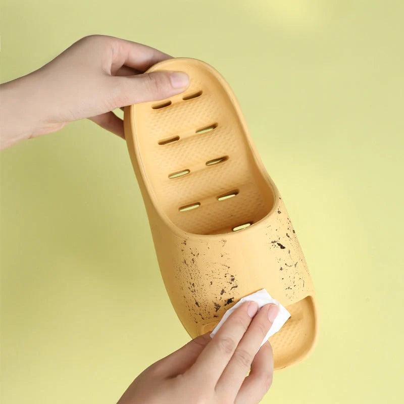 Thick-soled EVA slippers in various colours with non-slip sole and water leakage design