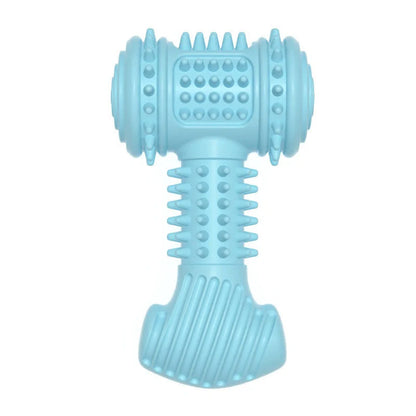 Indestructible TPR dog chew toy in blue, pink, and green for teeth cleaning and anxiety relief