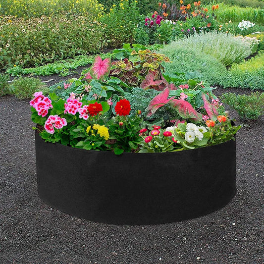 Round black and green fabric grow bags for garden plants with automatic drainage