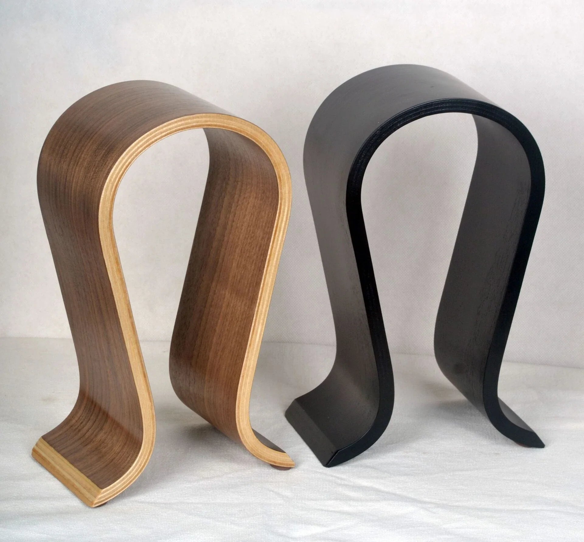 Elegant solid wood headphone stand in a contemporary design for beautiful display of audio equipment