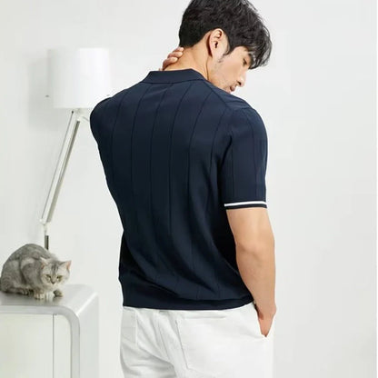Short-sleeved polo shirt with zipper collar, available in white and dark blue colours, suitable for British summer style.