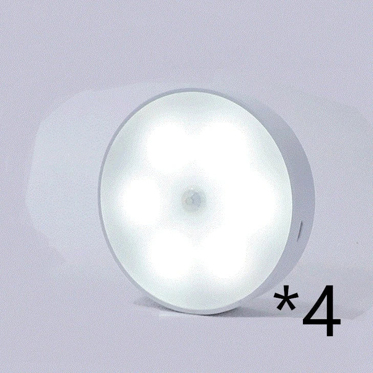 Motion-activated LED puck lights in warm and white color options, with various pack sizes and USB recharging
