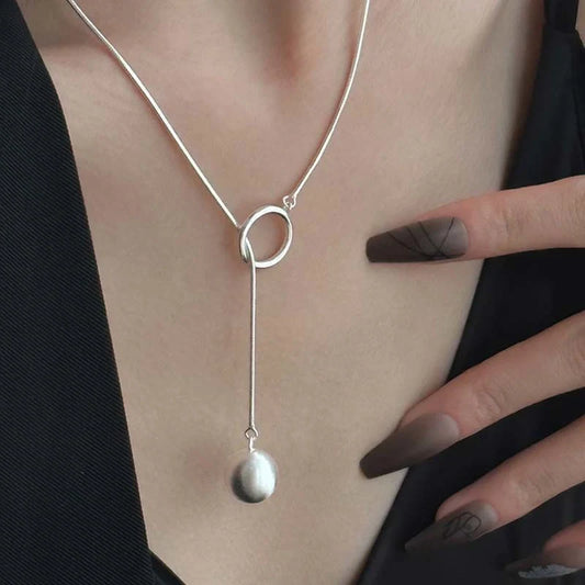 Platinum-plated round ball necklace with snake-bone chain, a versatile and elegant accessory for fashion-forward British women