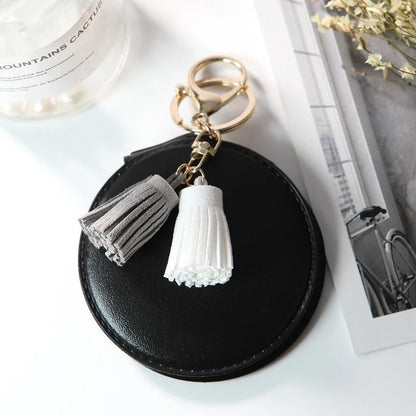 Mini round PU leather small mirror with lovely tassel in various colours