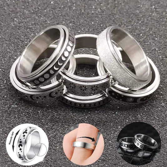 Elegant stainless steel spinner ring with a captivating moon and star design that rotates effortlessly for a calming tactile experience