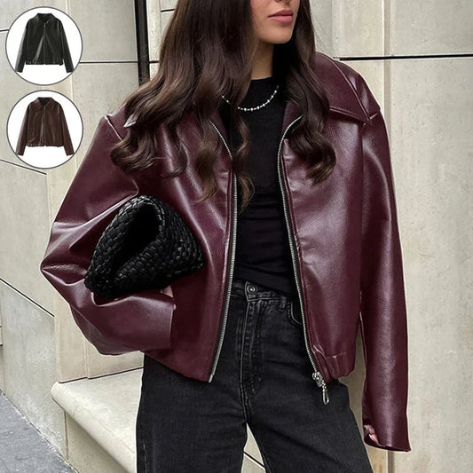 Fashionable faux leather jacket in burgundy and black colors, featuring a zipper closure and long sleeves for casual, versatile wear