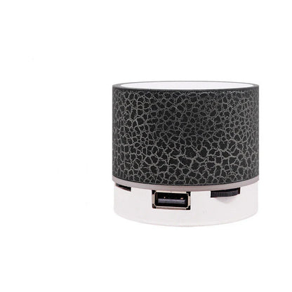 Portable Bluetooth speaker with colorful changing lights, high-quality audio, and durable design for on-the-go use