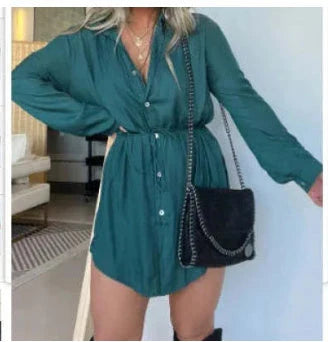 Women's long sleeve jumpsuit with button accents in various vibrant colors
