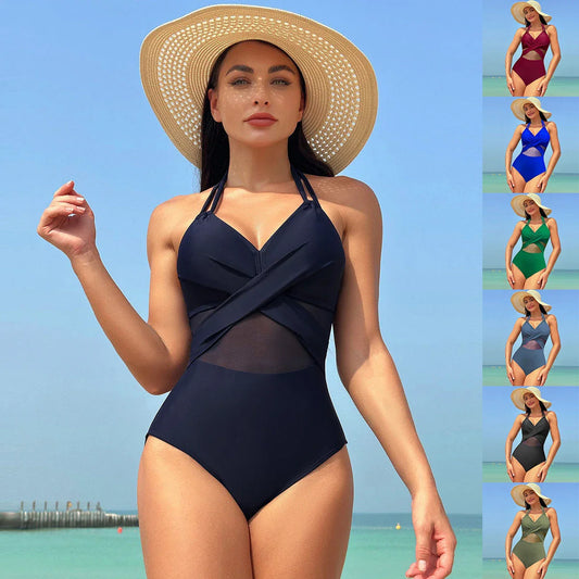 Stylish halter-neck one-piece swimsuit in various colors with cross-strap details and mesh design, perfect for summer beach and vacation wear