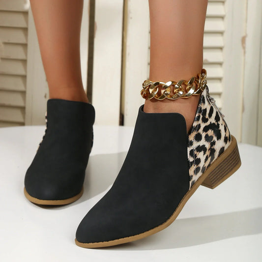 Women's leopard print boots with pointed toe and chunky heel, available in multiple sizes