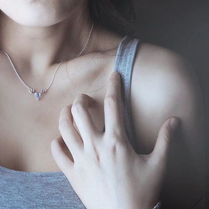 Elegant silver-toned elk necklace with a captivating moonstone pendant, a stunning Korean-inspired jewellery piece