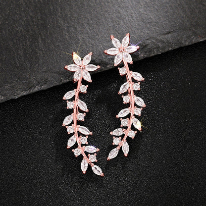 Stylish diamond flower earrings for women in white gold, gold, and rose gold