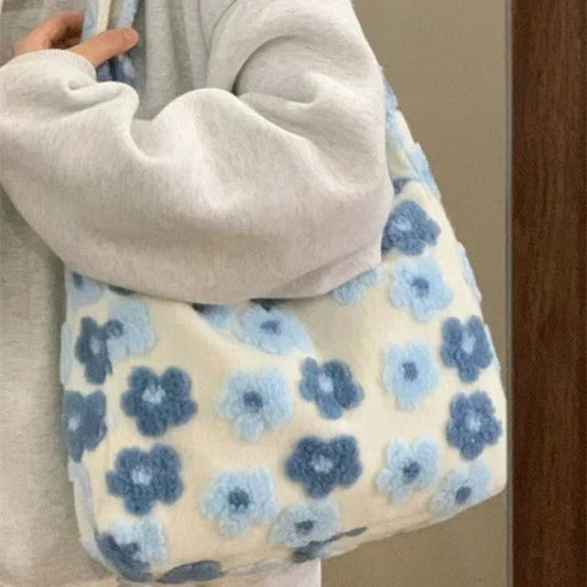 Large capacity fur bag with floral elements and adjustable straps