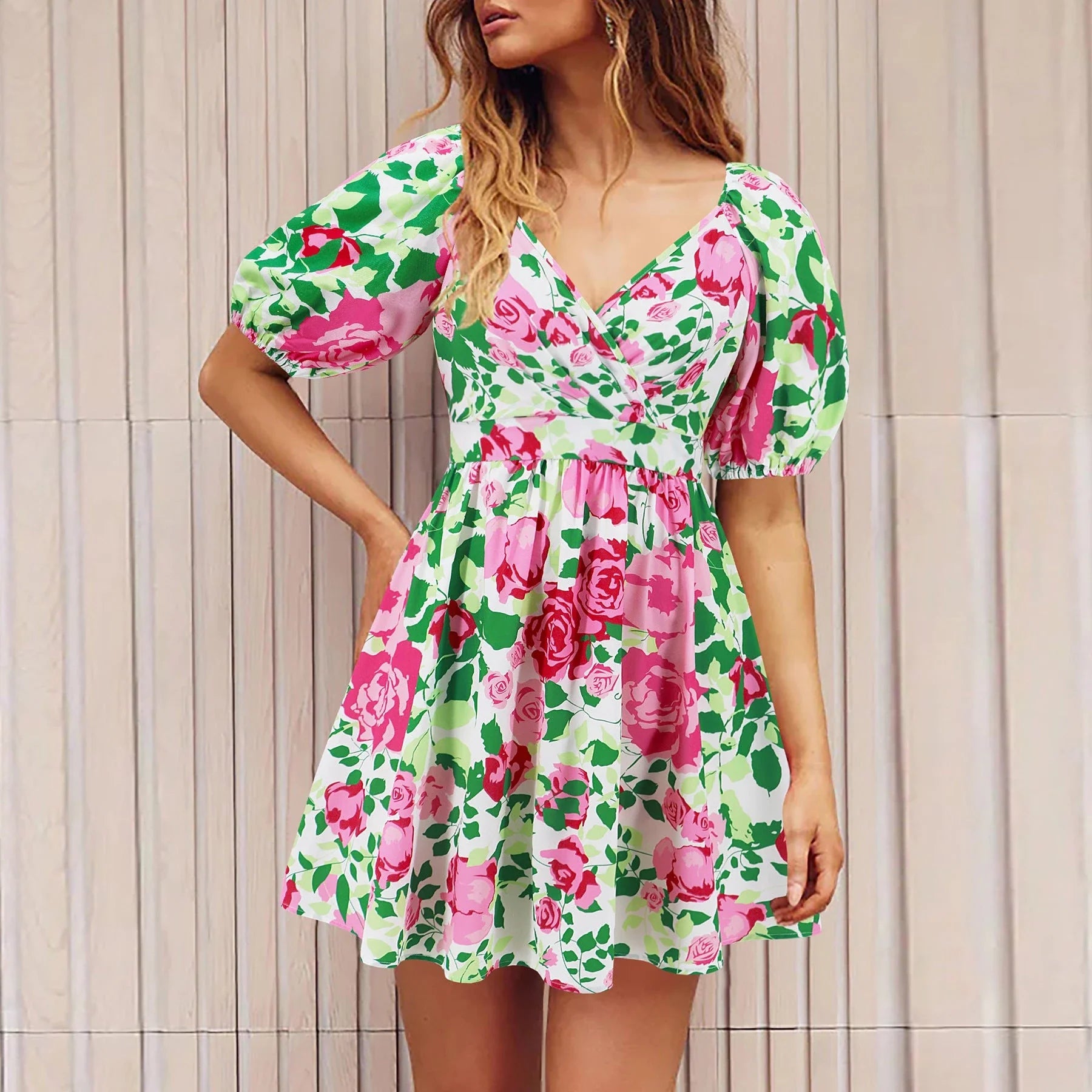 Stylish floral dress with V-neck and lantern sleeves, perfect for summer vacations and warm-weather occasions