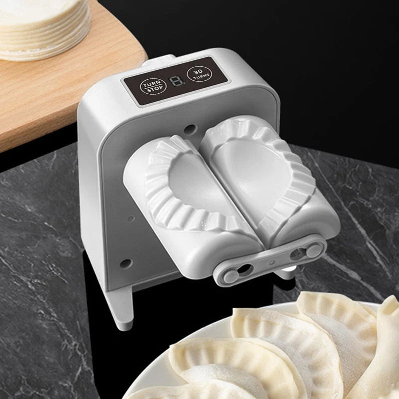 Electric Dumpling Maker Machine in white, compact and efficient for kitchen use
