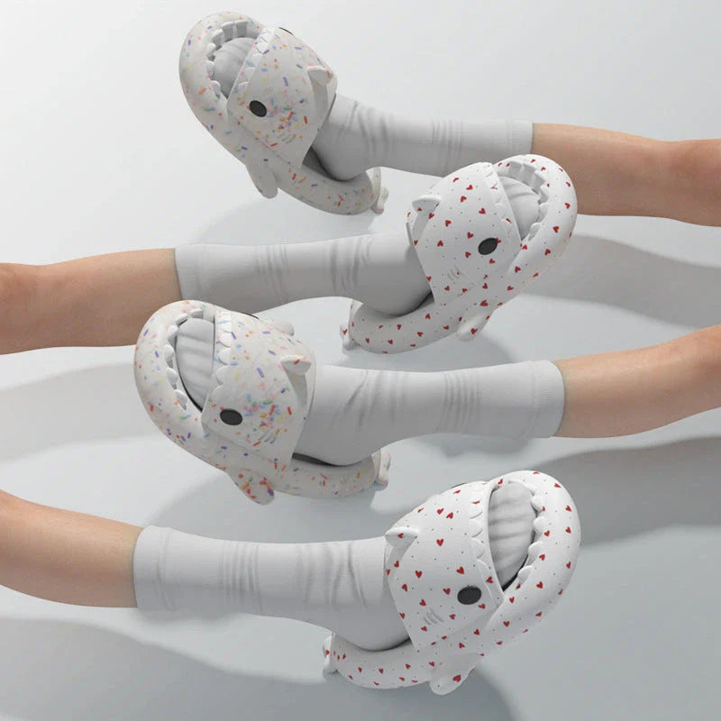 Cute shark-themed slippers with heart print design in various vibrant colors