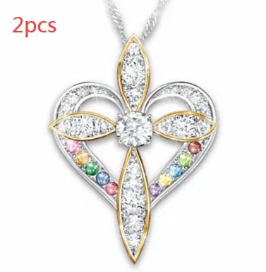 Elegant heart-shaped cross pendant necklace with adjustable chain, perfect for unisex wear.