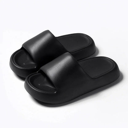 Comfortable EVA foam slip-on slippers in various colors, featuring non-slip soles and a breathable design for indoor and bathroom use.