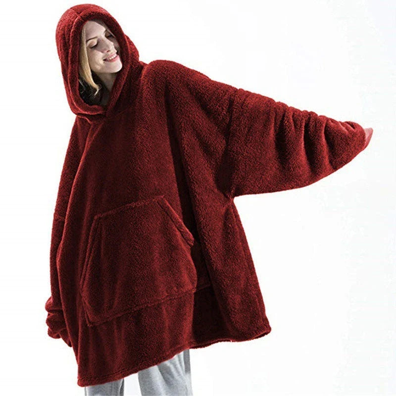 Cozy oversized hooded sweatshirt with big front pocket, made of soft double-sided fleece fabric in a variety of classic colors.
