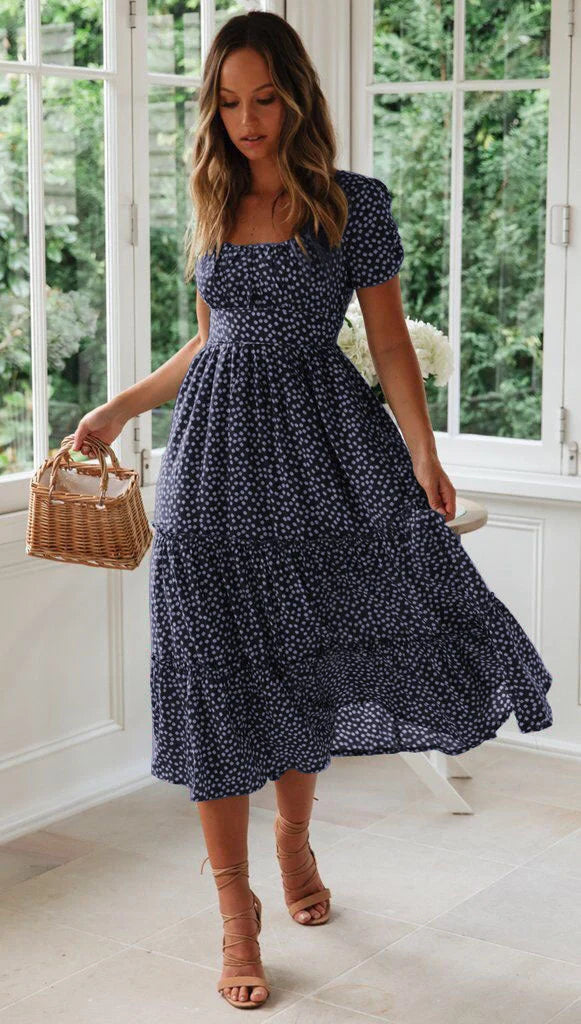 Elegant floral puff sleeve midi dress in various colours and patterns