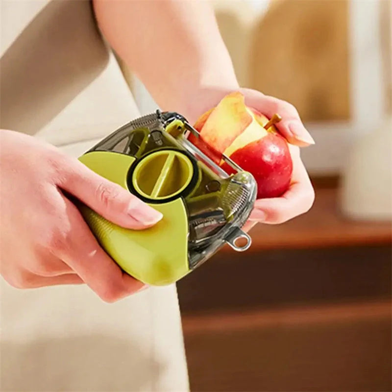 3-in-1 Stainless Steel Peeler Shredder in green and grey with ergonomic handle