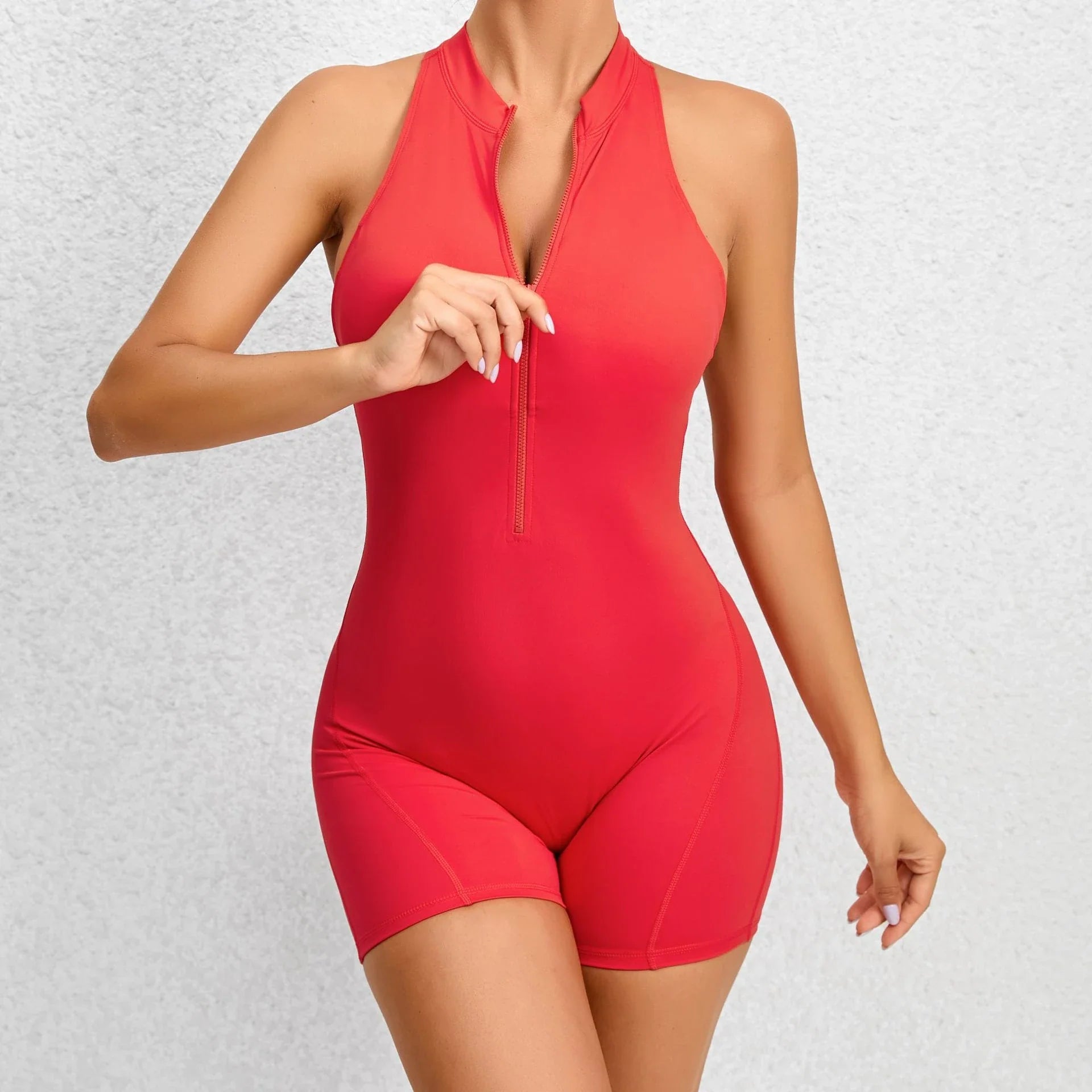 Sculpting stretch jumpsuit in various vibrant colors for active women