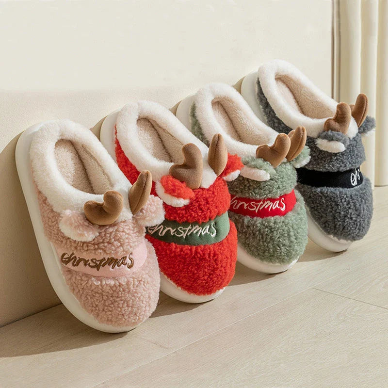 Cozy elk-themed slippers in a variety of festive colors, featuring a plush suede upper and supportive EVA sole for maximum comfort and warmth.
