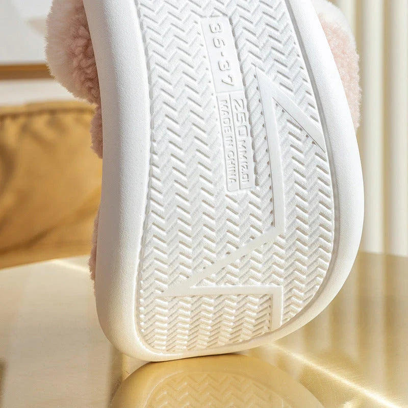Cozy elk-themed slippers in a variety of festive colors, featuring a plush suede upper and supportive EVA sole for maximum comfort and warmth.