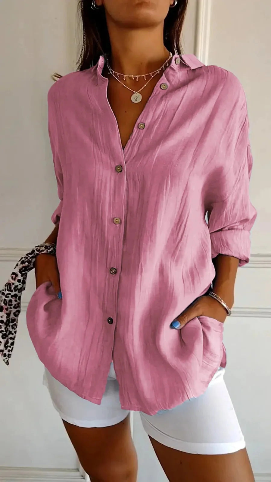 A stylish long-sleeved shirt with a pleated design, available in a variety of colours to suit any occasion.