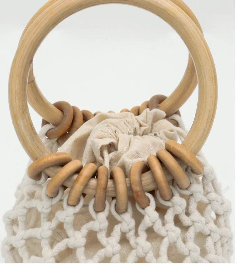 Stylish woven beach bag with wooden handle, perfect for summer outings