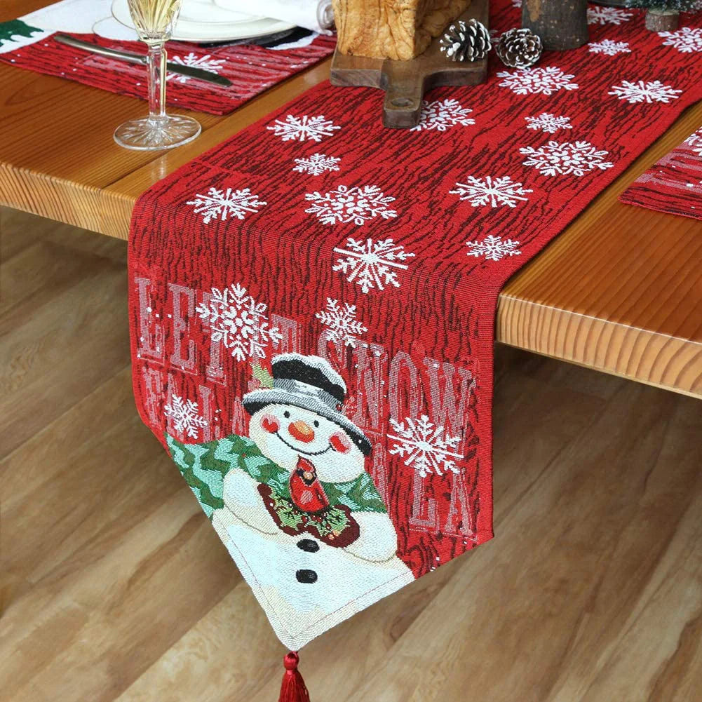 Christmas tablecloth with snowman and snowflake design in red