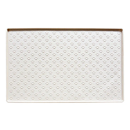 Waterproof and easy-to-clean silicone pet mat in various colours, designed for the comfort and convenience of dogs and cats in the UK.