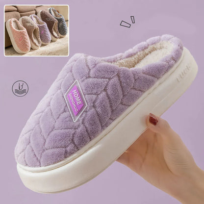 Cosy plush slippers in a variety of vibrant colours, featuring a soft fleece lining and durable non-slip sole for maximum comfort and stability.
