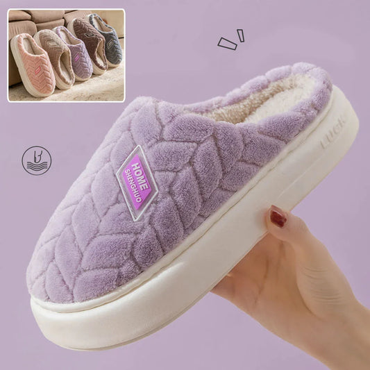 Cosy plush slippers in a variety of vibrant colours, featuring a soft fleece lining and durable non-slip sole for maximum comfort and stability.