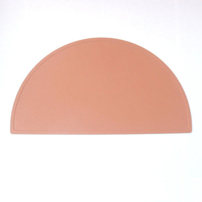 Durable silicone placemat in various colors, featuring waterproof and stain-resistant properties for easy cleaning