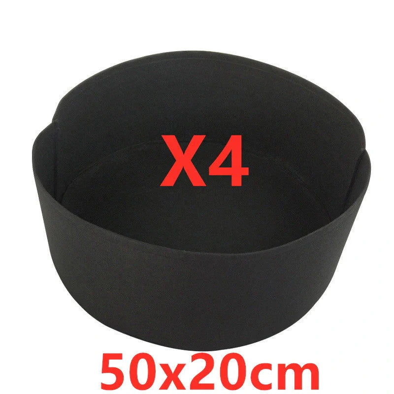 Round black and green fabric grow bags for garden plants with automatic drainage