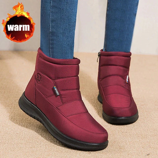 Women's waterproof snow boots in red, black, and brown with non-slip soles