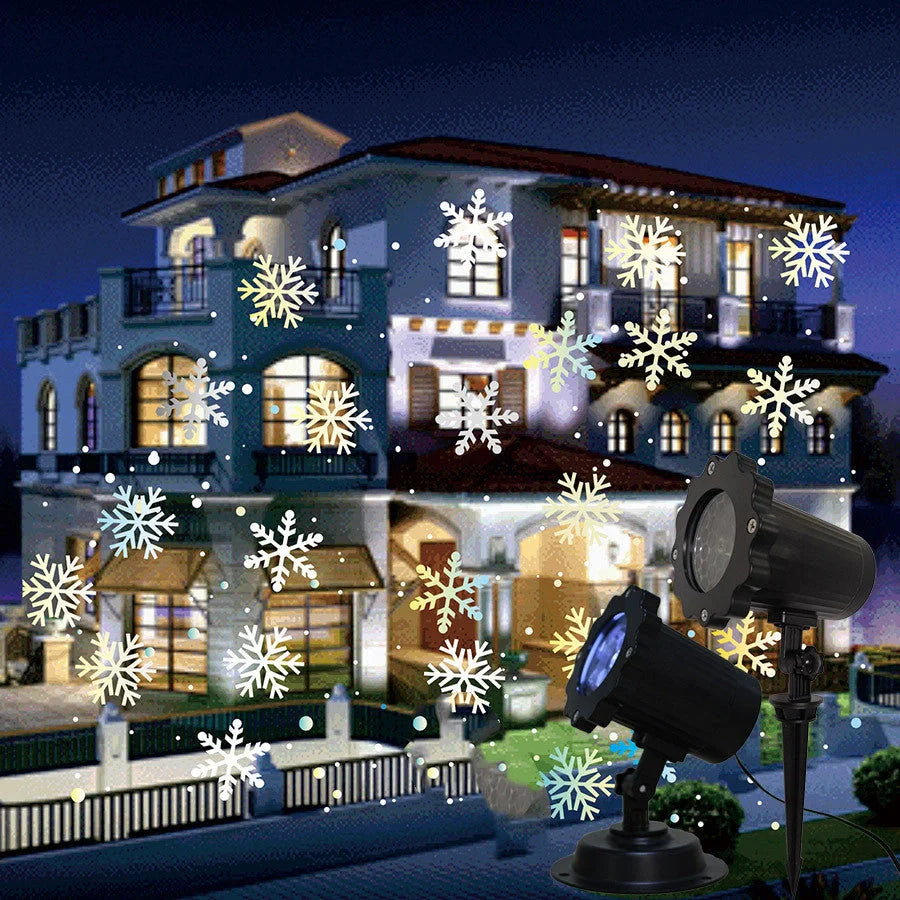 LED Christmas Blizzard Snowflake Laser Light Projector illuminating a garden with white snowflake patterns