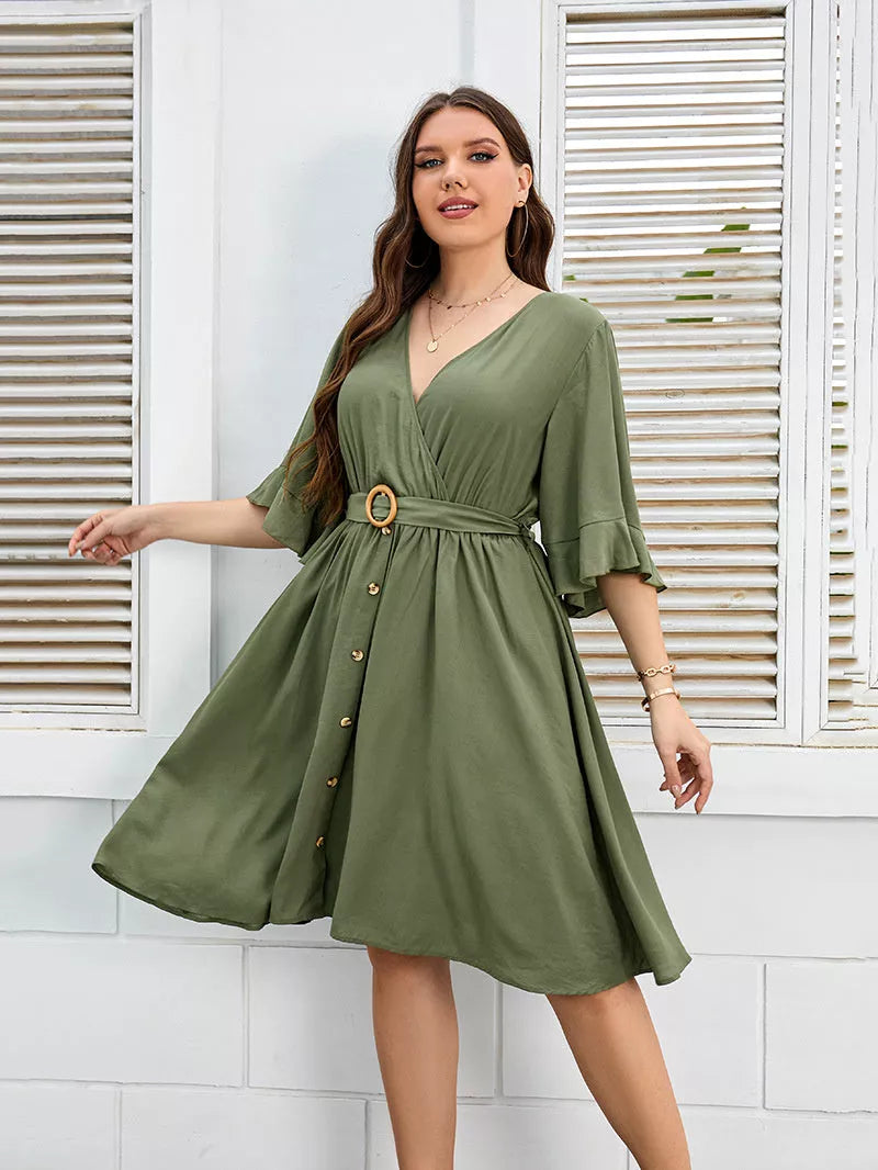 Plus-size green party skirt with V-neck and ruffle sleeves