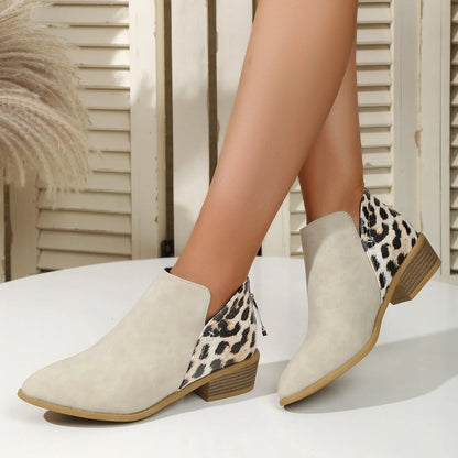 Women's leopard print boots with pointed toe and chunky heel, available in multiple sizes