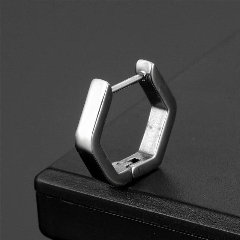 Stainless steel triangular hoop earrings in white, black, and gold options