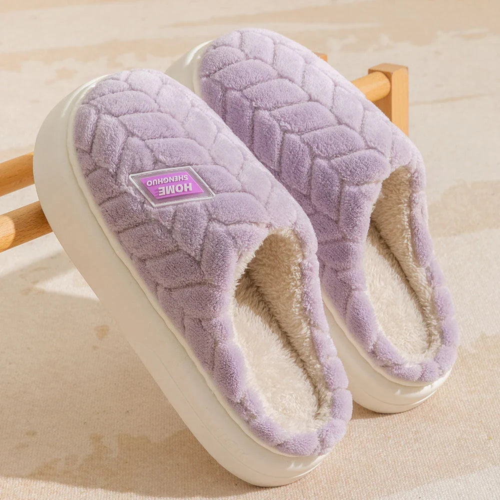 Cosy plush slippers in a variety of vibrant colours, featuring a soft fleece lining and durable non-slip sole for maximum comfort and stability.