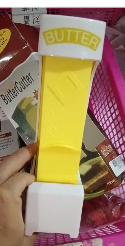 Yellow Stick Butter Cutter Cheese Slicer with one-button dispenser for kitchen use