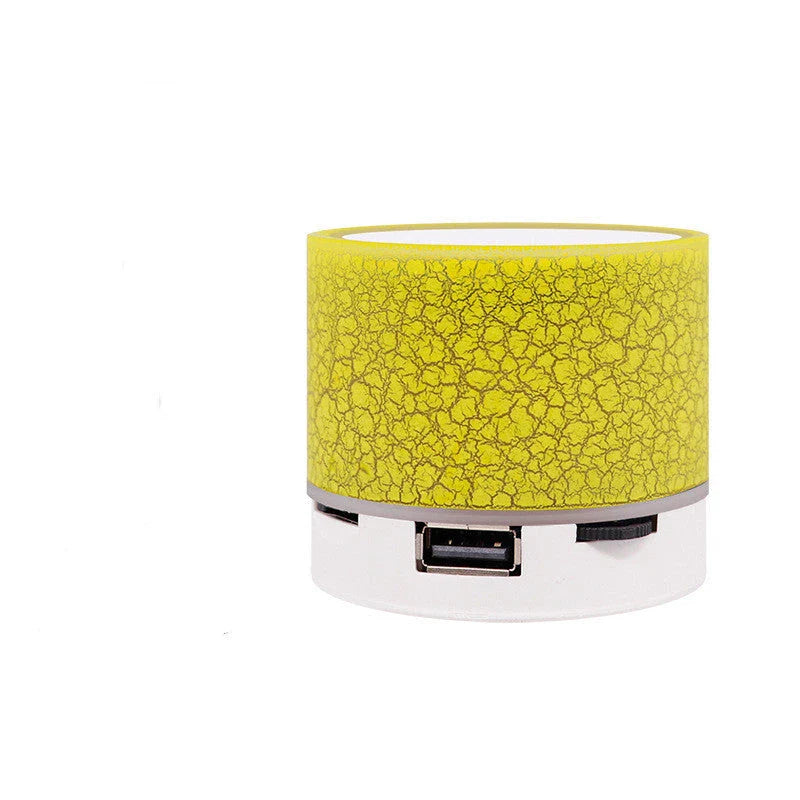 Portable Bluetooth speaker with colorful changing lights, high-quality audio, and durable design for on-the-go use