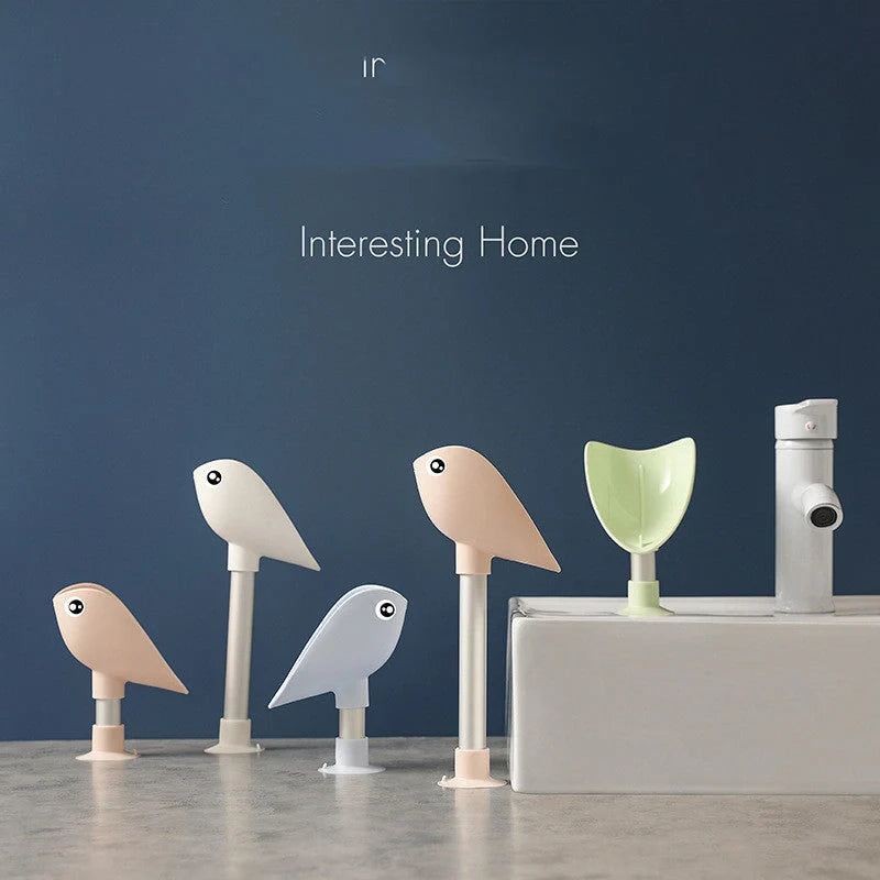 Bird Soap Box with self-draining design and silicone suction cup in white, pink, green, and blue
