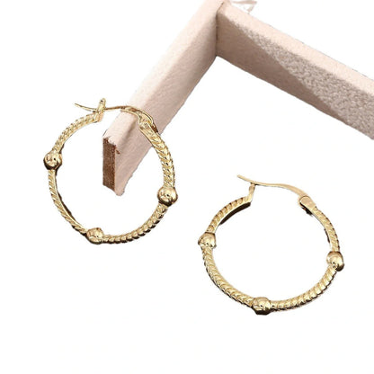 Retro geometric round earrings in gold, silver, and rose gold for a vintage look